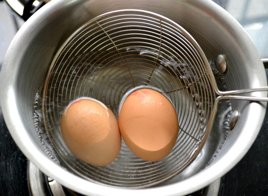 immerse eggs in hot water |kannammacooks.com #boil #eggs