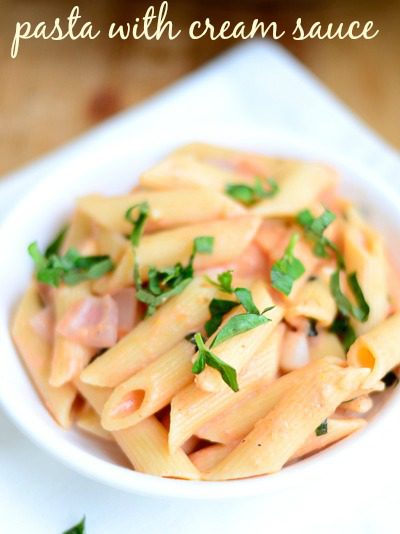 pasta-with-garlic-tomato-cream-sauce-and-basil-comfort-food-italian-recipe |kannammacooks.com #garlic #basil #tomato #pasta #cream #sauce #30-minutes #dinner #easy #recipe #italian - 1